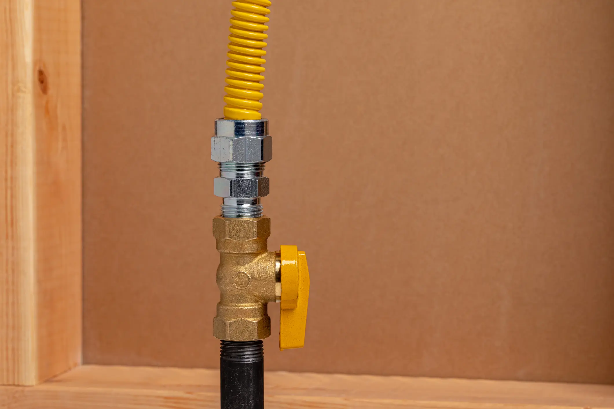 Yellow flexible gas line with shutoff valve