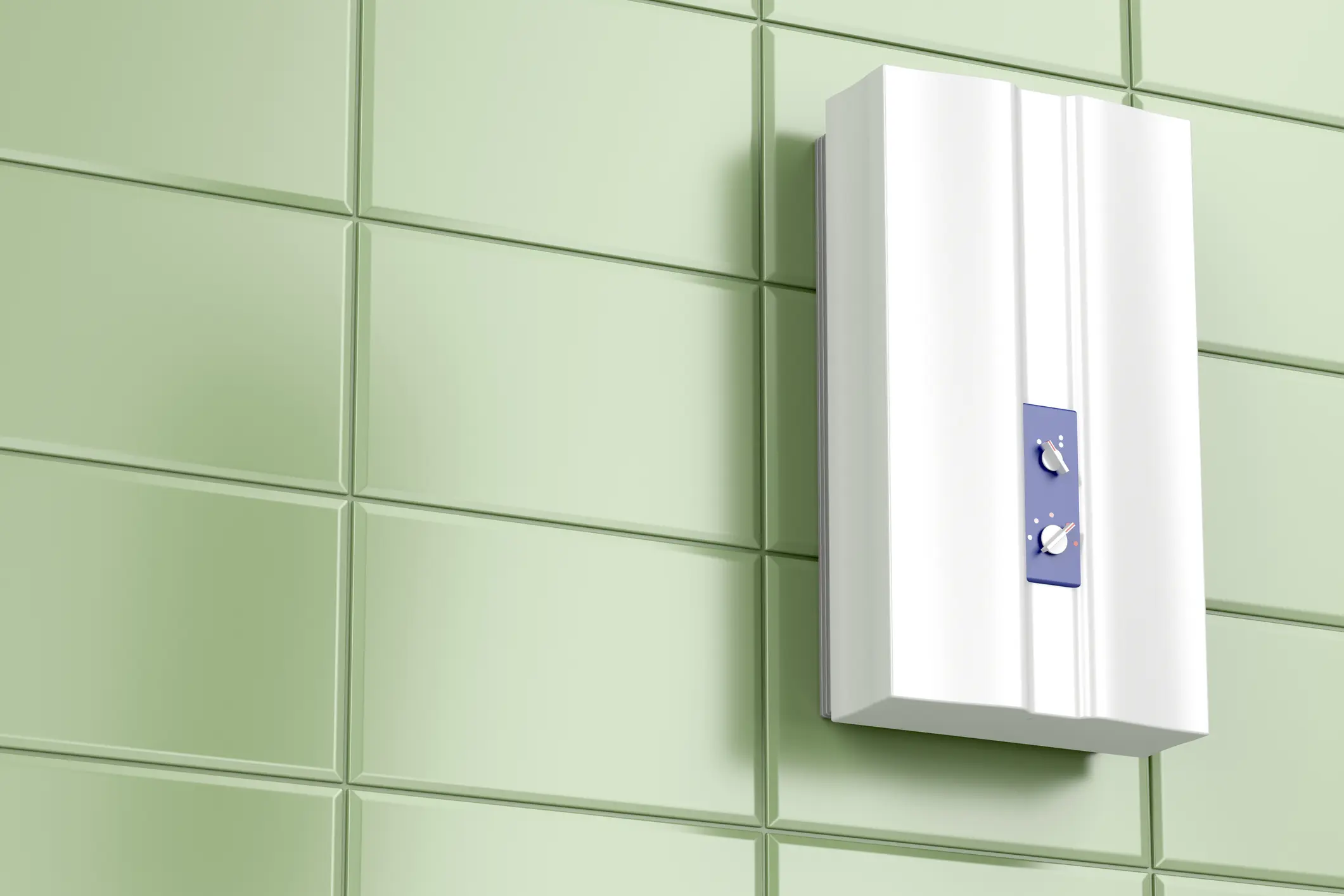 White tankless water heater on green tiles