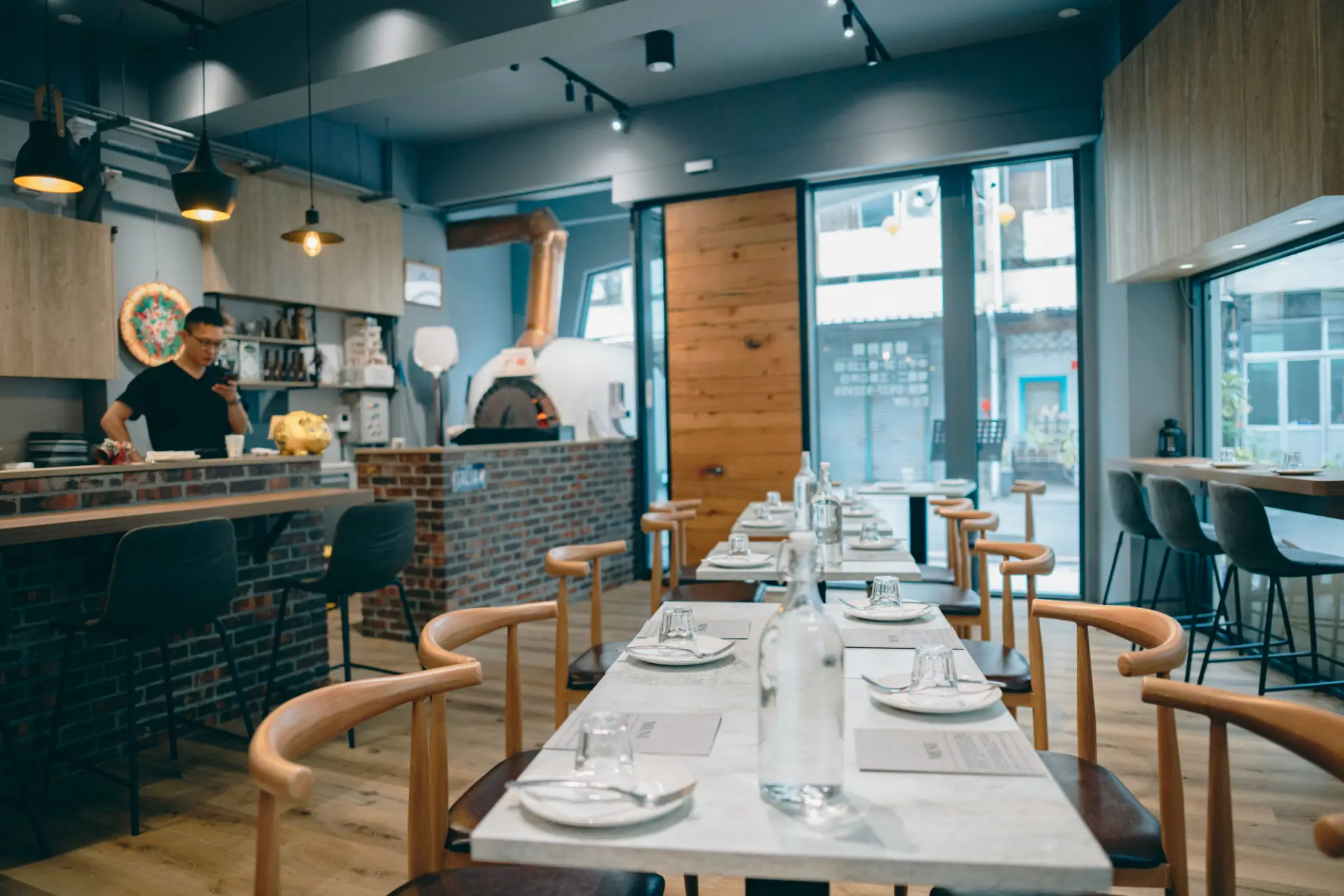 Modern cozy restaurant interior with set tables