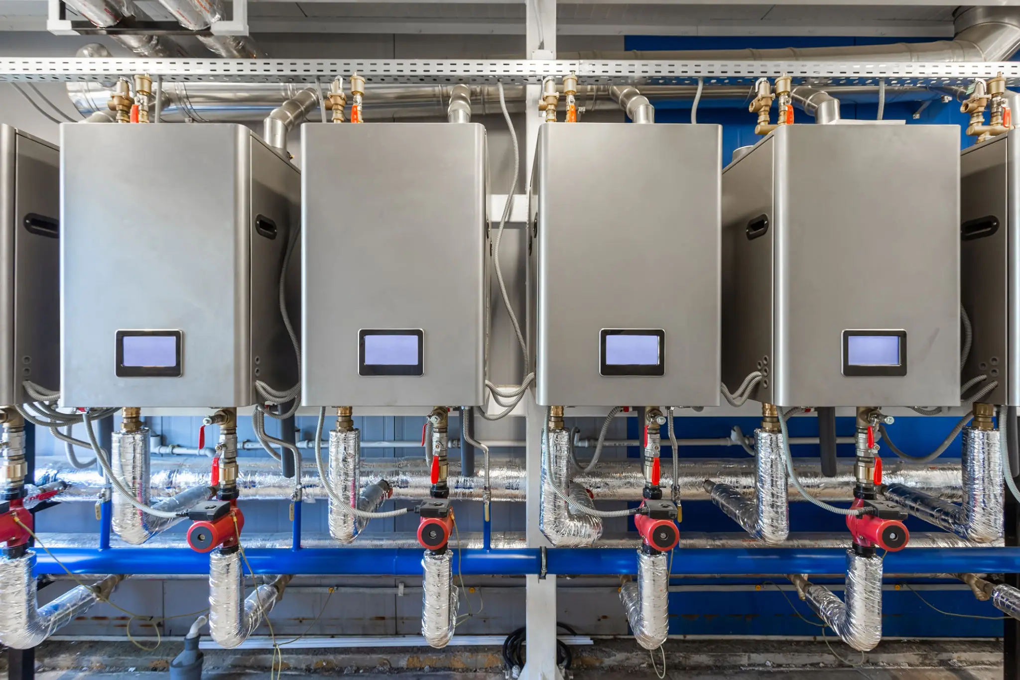 Industrial hot water boilers with pumps and piping